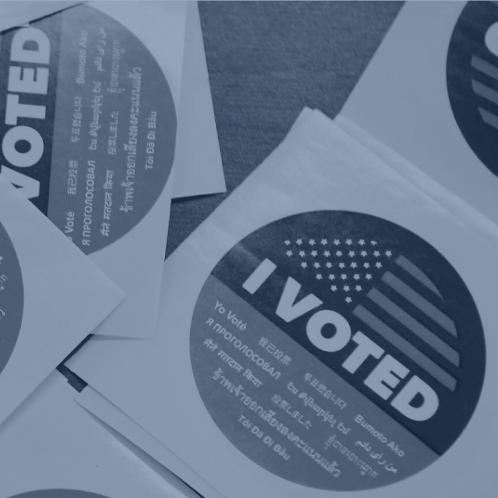 Stickers that read "I voted" in many languages